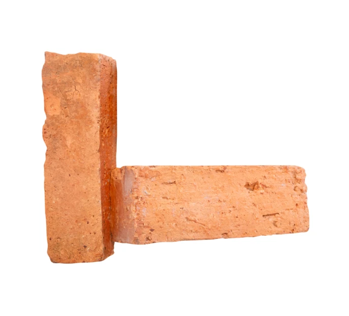 Two red clay bricks isolated on white background