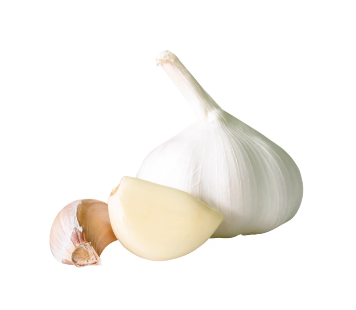 Whole garlic bulb and cloves isolated on white background