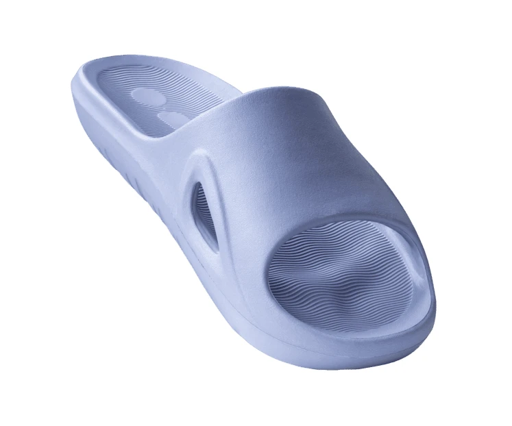 Light blue foam platform slide sandal isolated on white