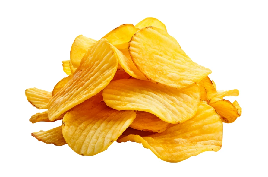 Pile of ridged potato chips isolated on white background