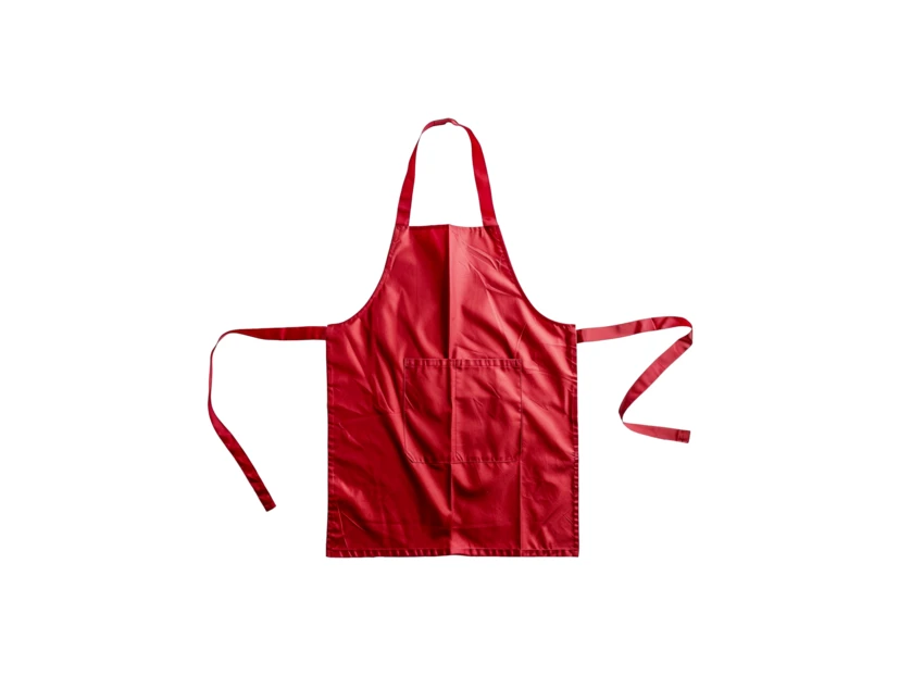 Red kitchen apron with pockets isolated on white background
