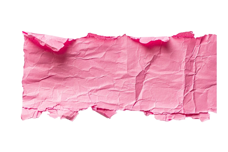 Pink crumpled and torn paper strip on white background