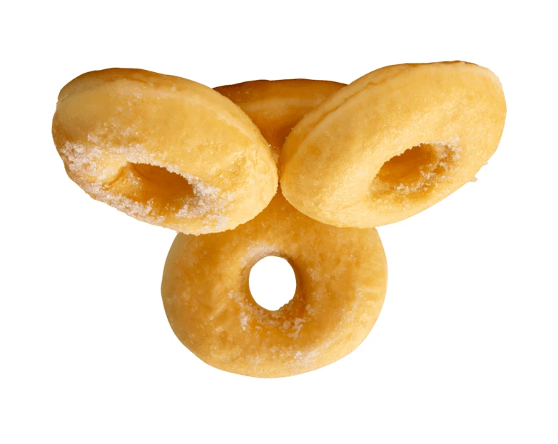 Four fresh glazed donuts isolated on white background