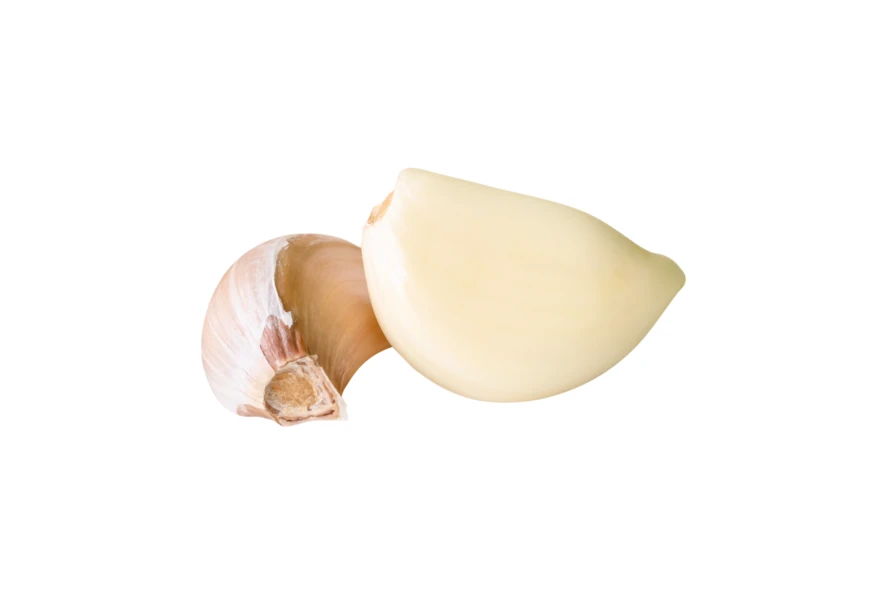 Two garlic cloves isolated on white background