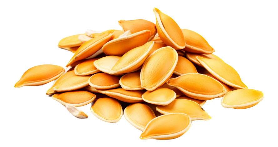 Pile of roasted pumpkin seeds isolated on white