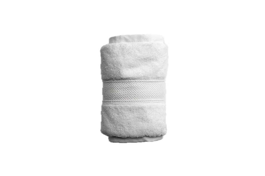 Rolled white cotton towel isolated on white background