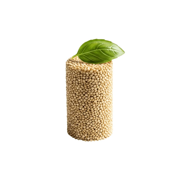 Cylindrical stack of amaranth grains with a green leaf