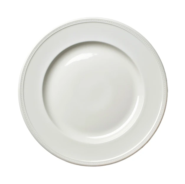 Empty white ceramic dinner plate with beaded rim