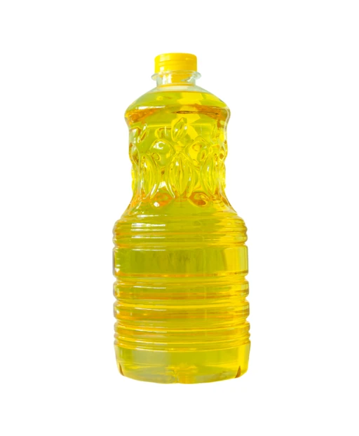 Plastic bottle of yellow vegetable cooking oil isolated on white