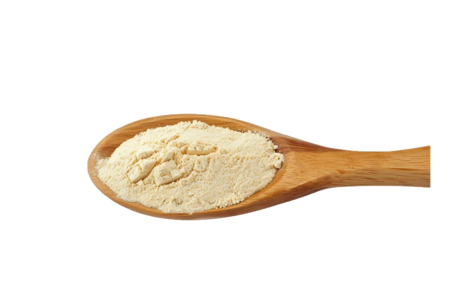 Fine beige powder on wooden spoon isolated on white