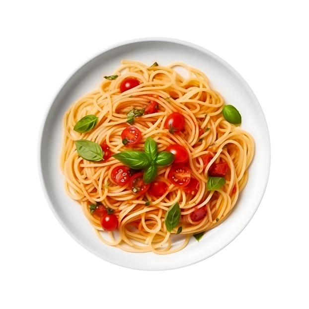 Spaghetti with cherry tomatoes and fresh basil on white plate