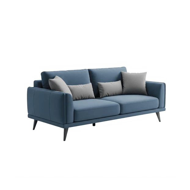 Modern blue fabric sofa with grey pillows on white background