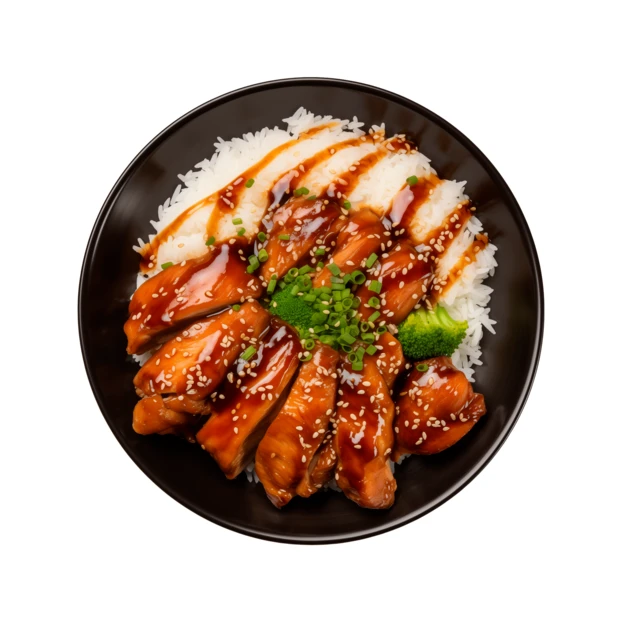 Top view of chicken teriyaki rice bowl isolated on white