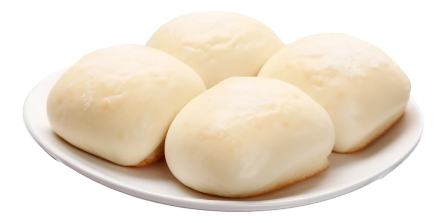 Fresh steamed mantou buns on white plate isolated
