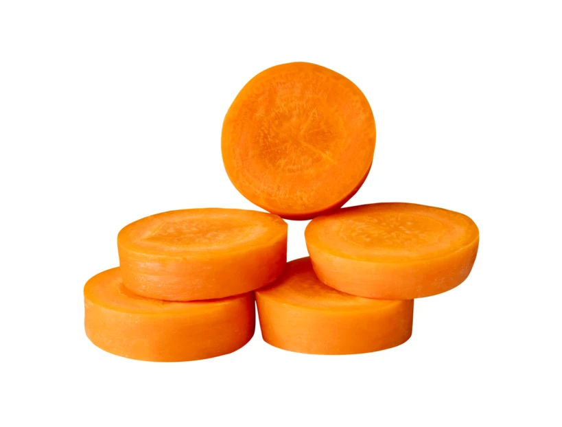 Sliced fresh carrot rounds isolated on white background