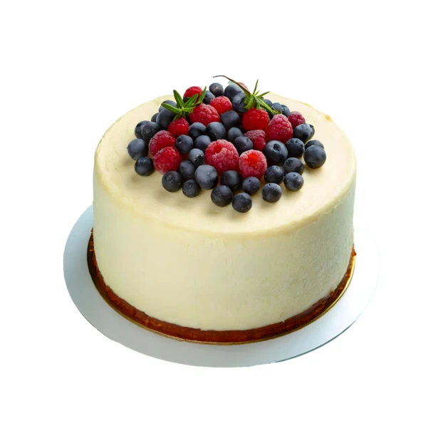 Round cheesecake topped with fresh blueberries and raspberries