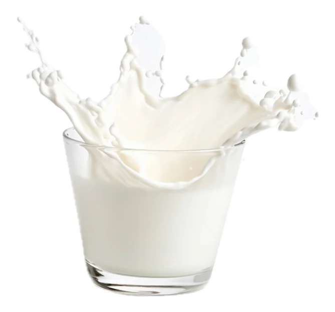Milk splashing out of a glass on white background