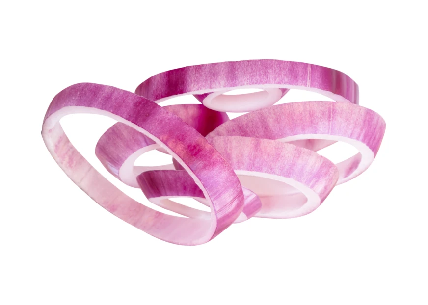 Sliced red onion rings isolated on white background