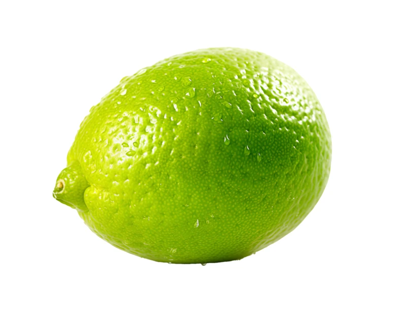 Single fresh green lime with water droplets on white background