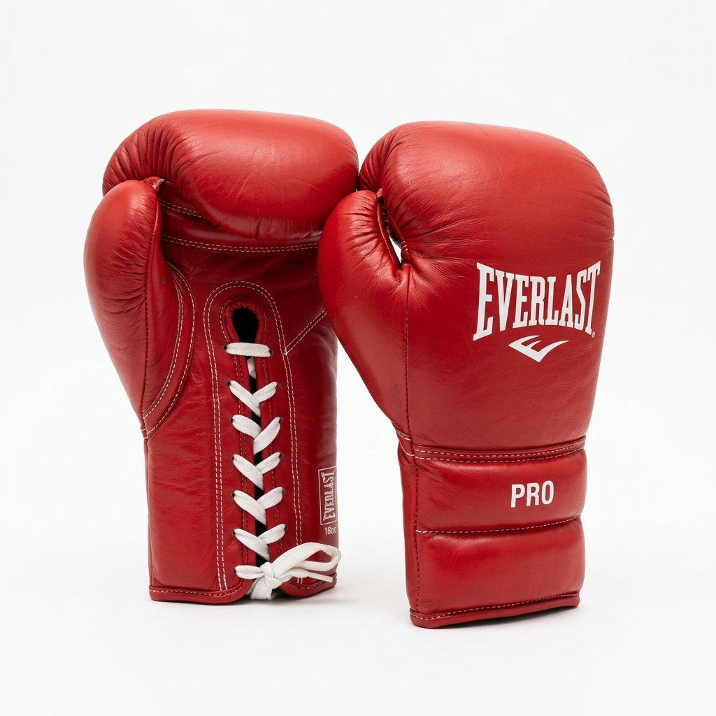 Pair of red professional boxing gloves on white background