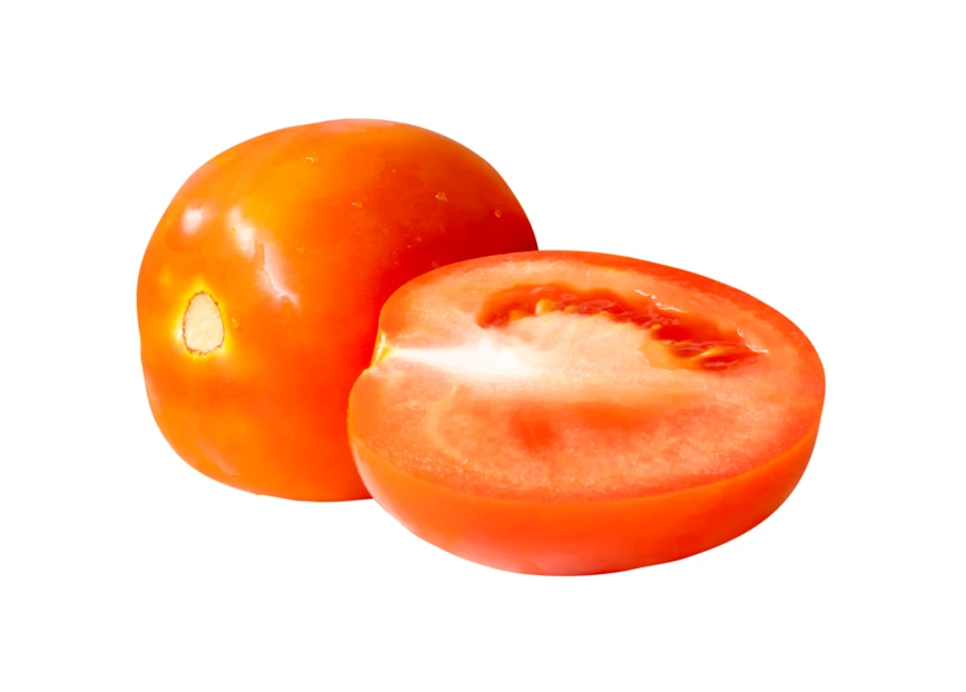 Fresh whole and half cut tomato isolated on white