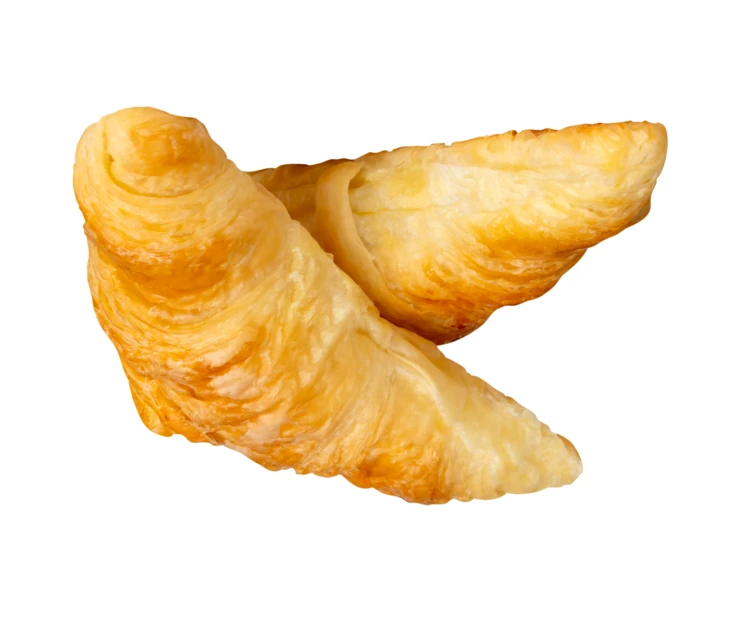 Two fresh buttery croissants isolated on white background