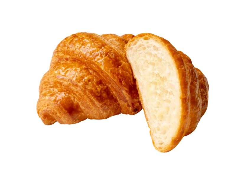 Fresh golden brown sliced croissant isolated on white background