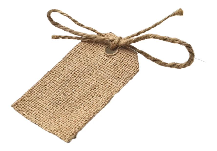 Blank burlap tag with twine bow isolated on white