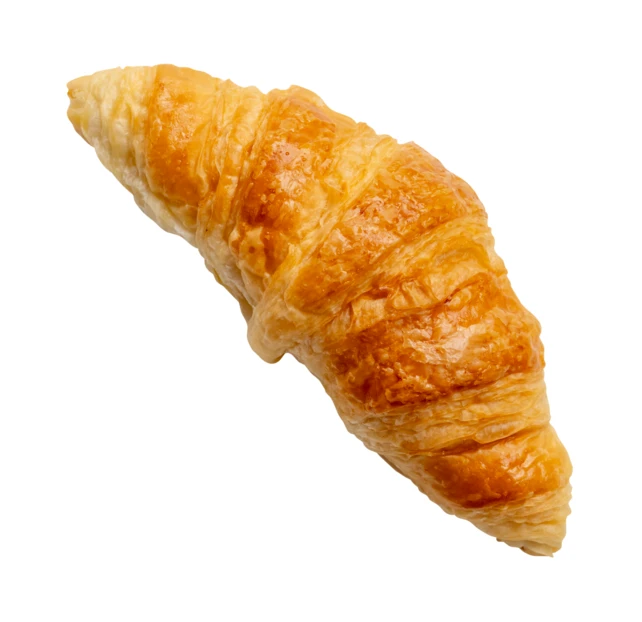 Golden brown buttery croissant isolated on white background