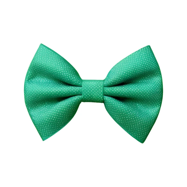 Green polka dot bow tie isolated on white background