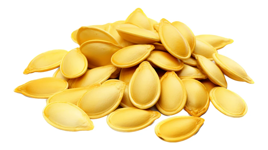 Pile of raw pumpkin seeds isolated on white background