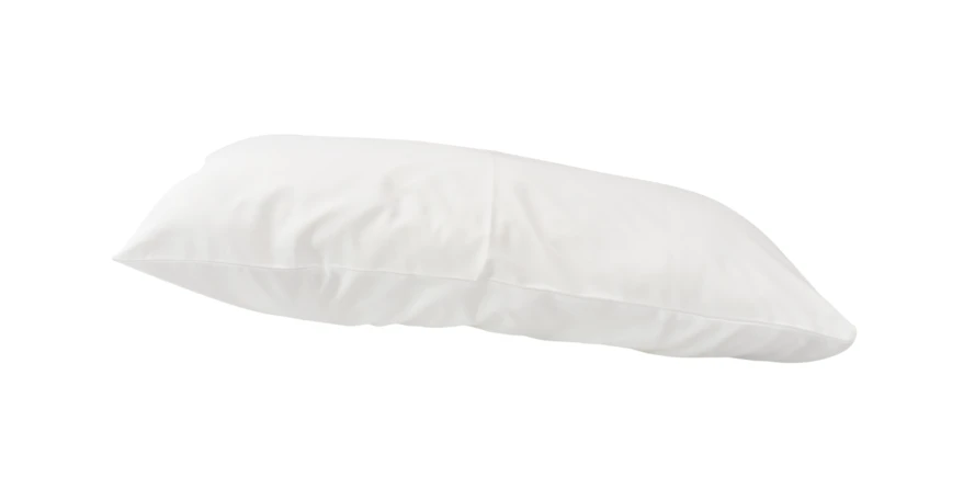 Soft white bed pillow isolated on white background