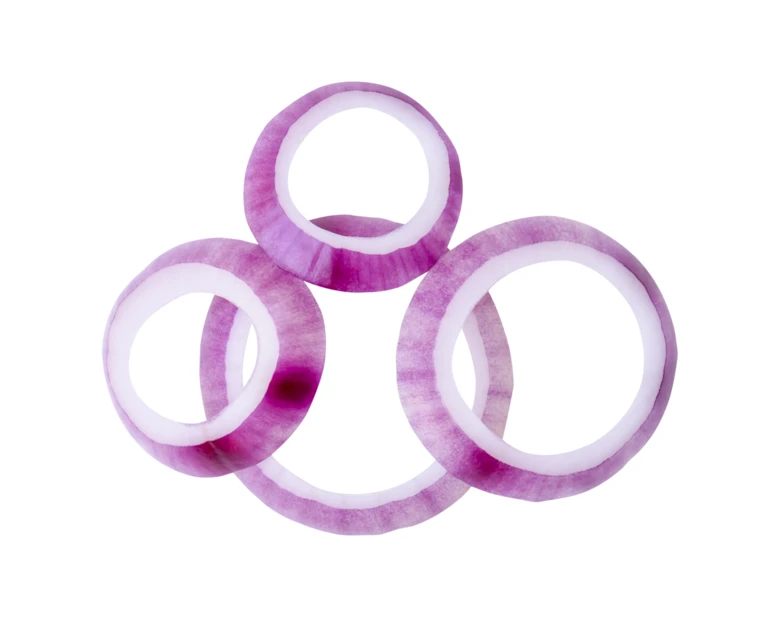 Fresh red onion rings isolated on white background
