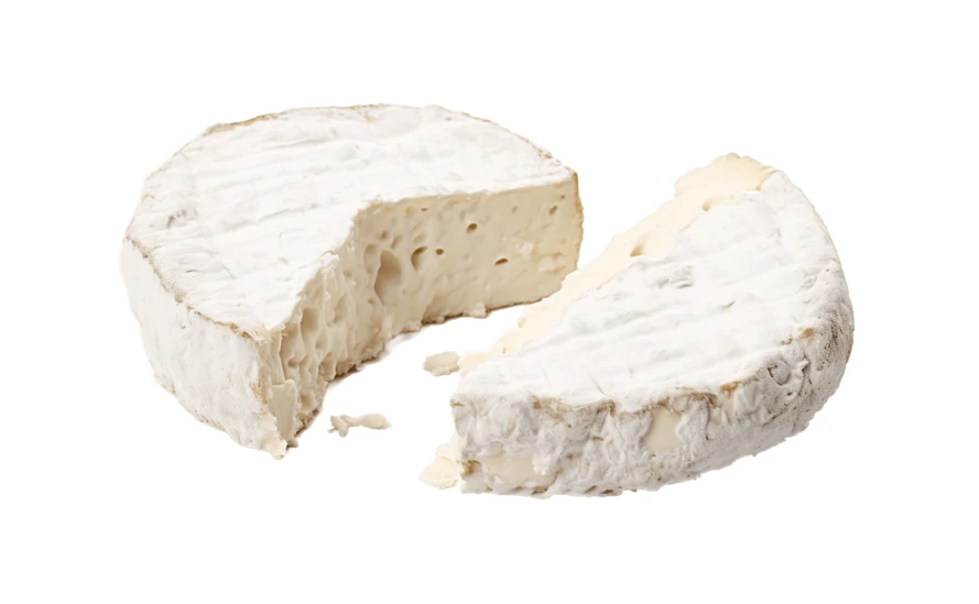 Soft ripened camembert cheese with a wedge cut out