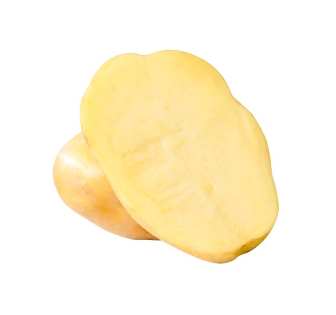 Fresh raw potato sliced in half on white background