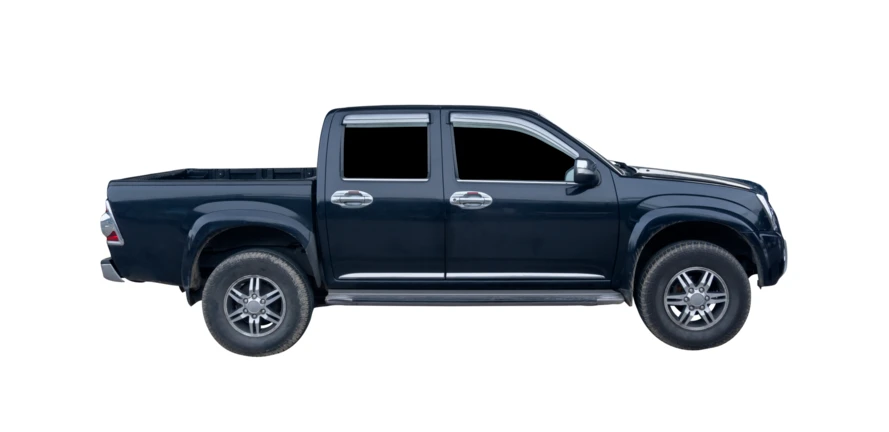 Side profile of a dark blue pickup truck on white