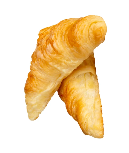 Two fresh golden croissants isolated on white background