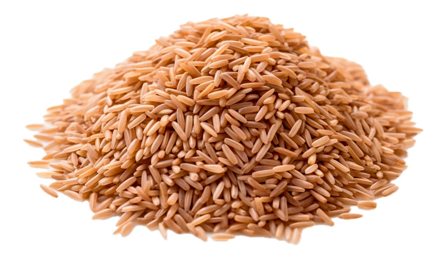 Heap of raw brown rice isolated on white background