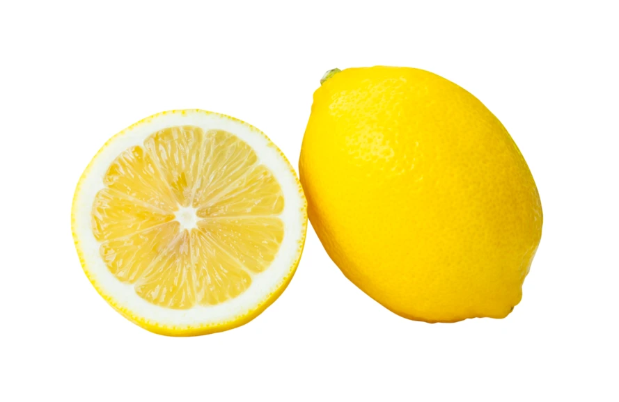 Fresh whole and halved lemon isolated on white background