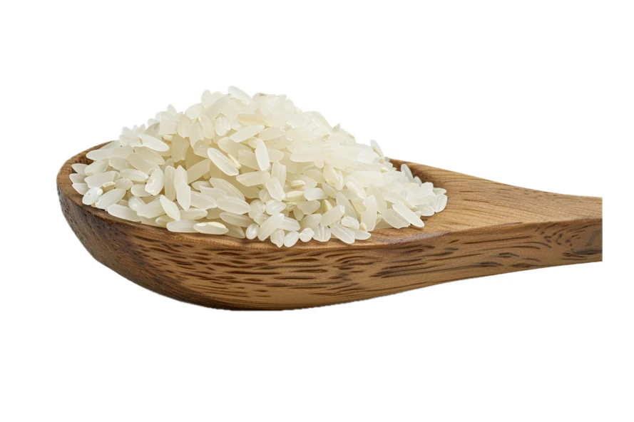 Wooden spoon filled with raw white rice grains