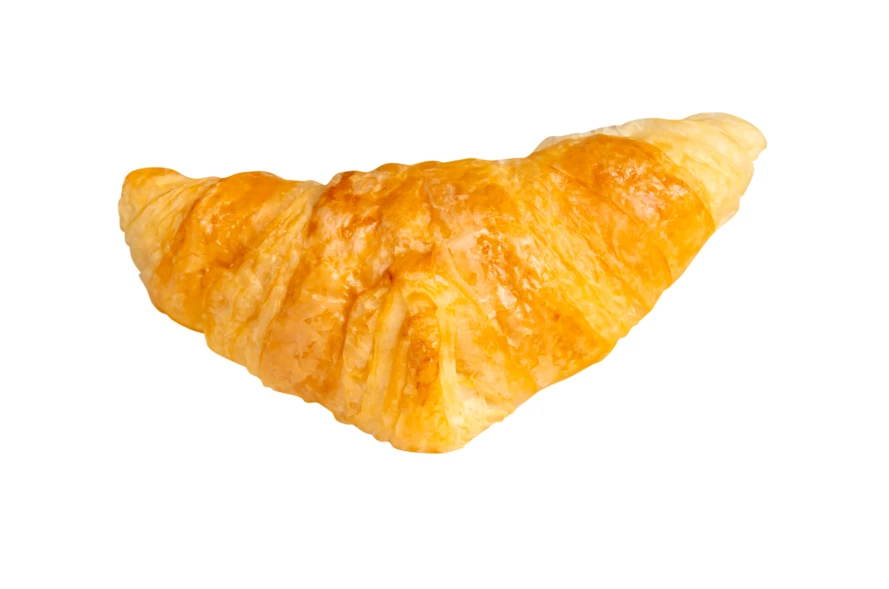 Freshly baked buttery croissant isolated on white background