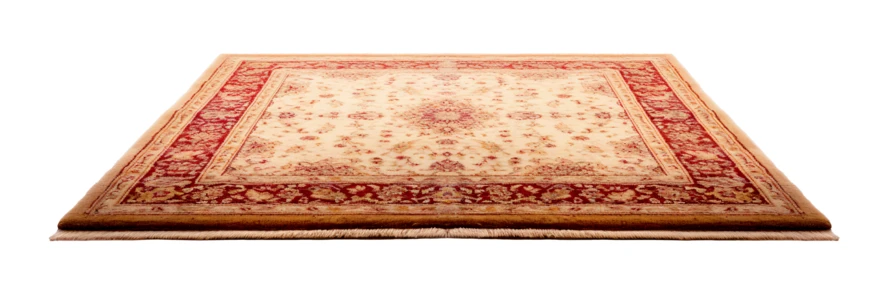 Traditional Persian rug with intricate red and cream pattern
