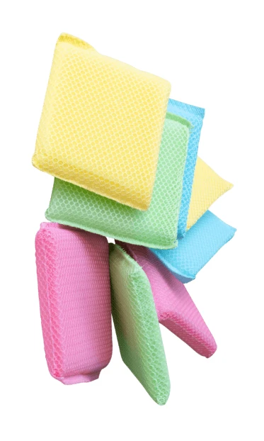 Colorful kitchen sponges floating on white background