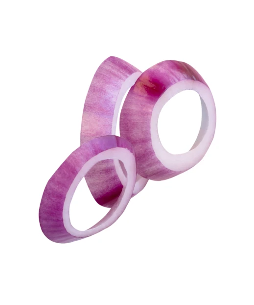 Sliced red onion rings isolated on white background