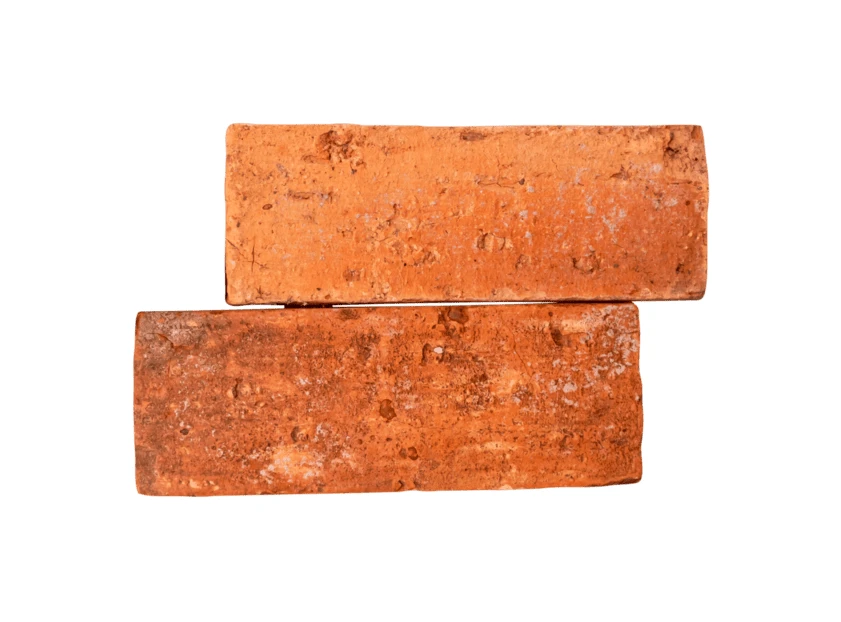 Two red clay bricks stacked on white background