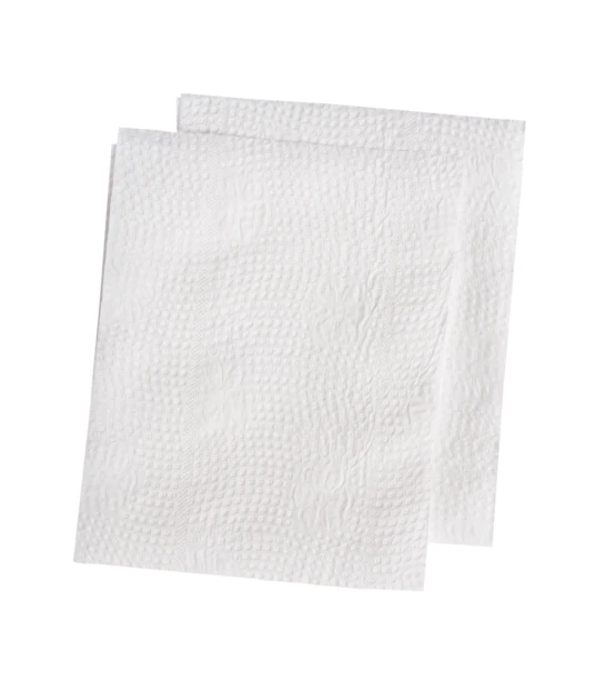 Two white textured paper napkins isolated on white background