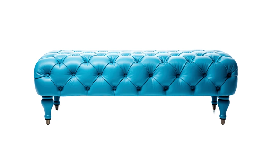 Bright blue tufted leather ottoman isolated on white background
