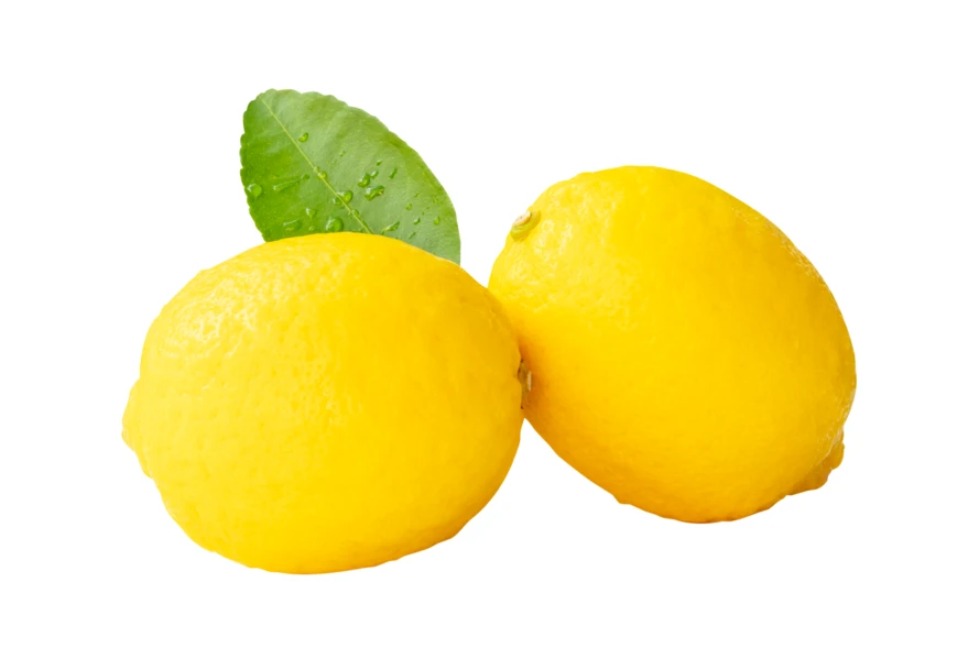 Two fresh yellow lemons with green leaf on white background