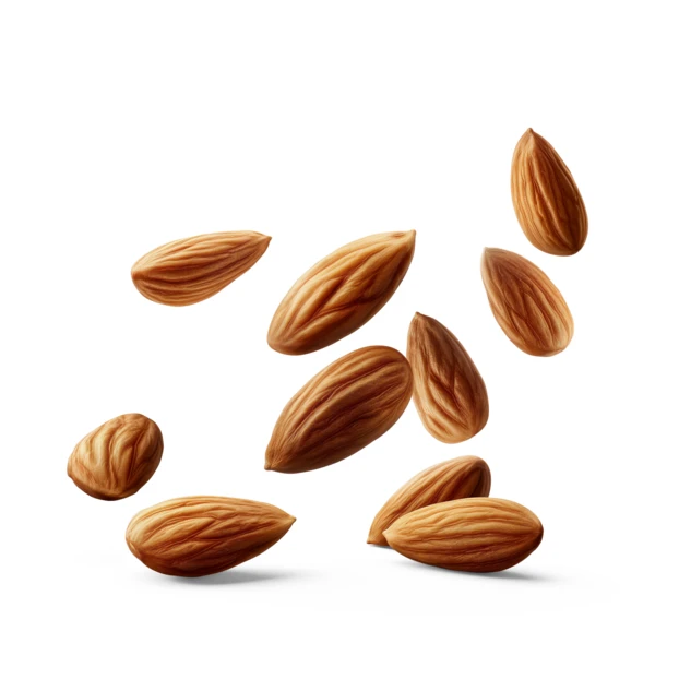 Falling whole raw almonds isolated on white background
