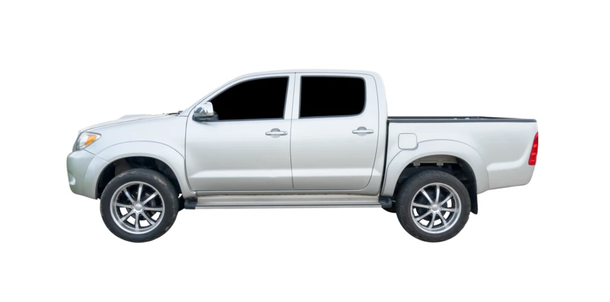 Silver pickup truck side profile isolated on white background